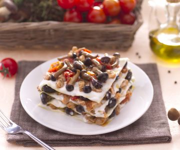 Lasagnes avec ragoût de lapin et champignons