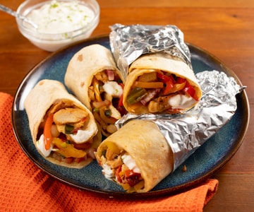 Fajitas de poulet et dés de lard fumé