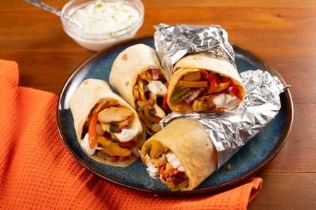 Fajitas de poulet et dés de lard fumé