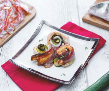 Roulades de filets de bar avec pancetta fumée et courgettes grillées au Prosecco