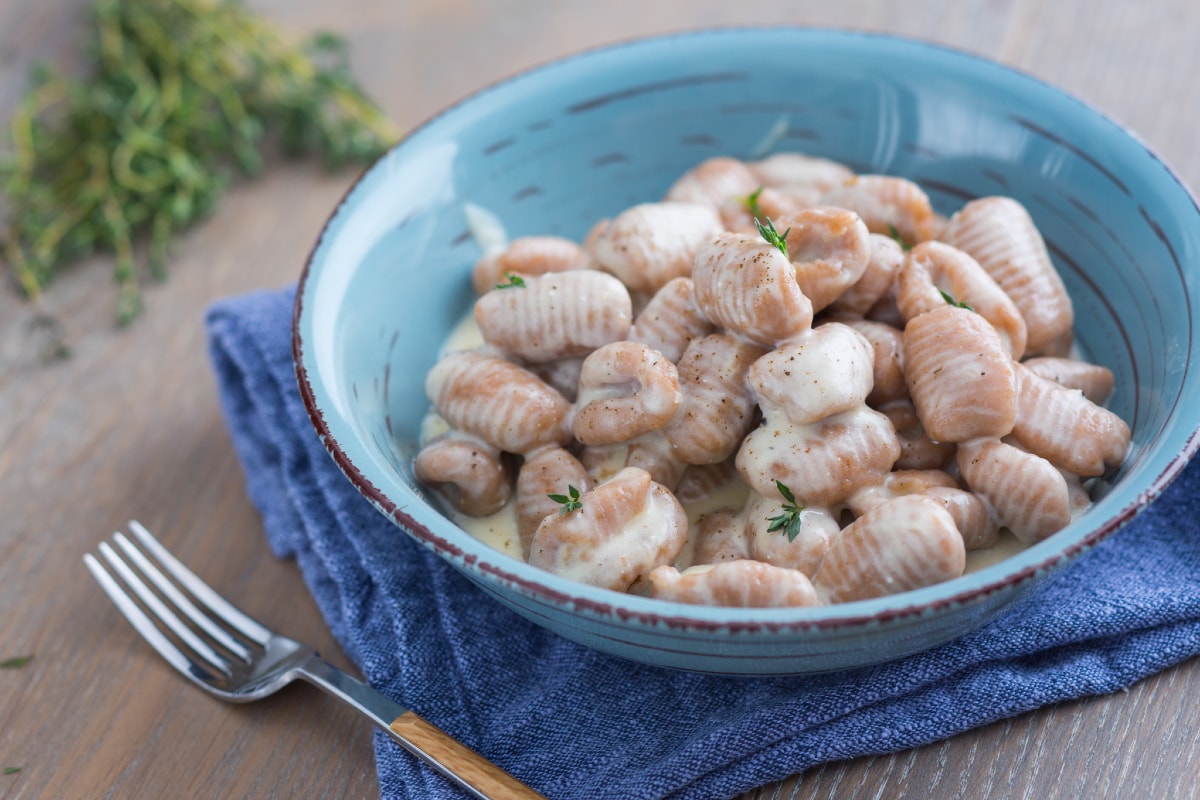 Gnocchi d'épeautre avec crème au Grana Padano