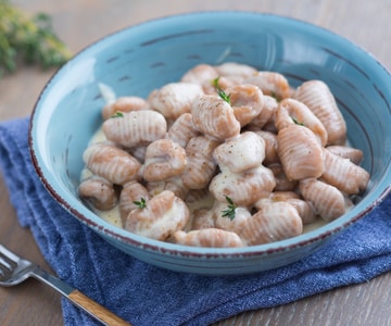 Gnocchi d'épeautre avec crème au Grana Padano