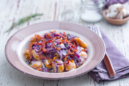 Gnocchi de potiron avec Grana Padano, chou rouge et speck