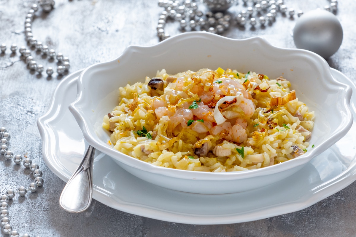 Risotto à l'orange avec espadon et crevettes