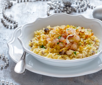 Risotto à l'orange avec espadon et crevettes