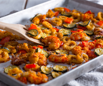 Calamars et crevettes gratinés avec des légumes