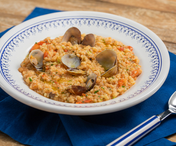 Fregola aux palourdes et tomates cerises