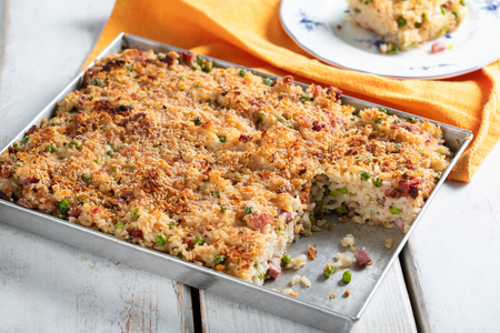 Riz gratiné fondant aux petits pois et speck