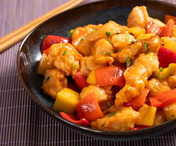 Poulet en sauce aigre-douce aux poivrons et à l'ananas
